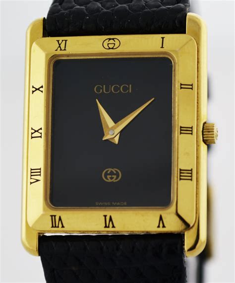 gucci gold tone black dial swiss quartz watch|gucci quartz watch stainless steel.